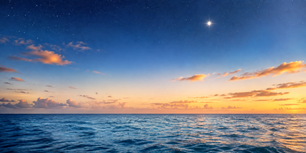 A bright guiding star shines above a calm ocean and distant island beneath a deep blue sky.